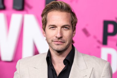 American actor Ryan Hansen arrives at the Los Angeles Premiere Of STARZ's 'Party Down' Season 3 held at the Regency Bruin Theatre on February 22, 2023 in Westwood, Los Angeles, California, United States.