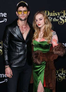Dylan McTee and Olivia Rose Keegan arrive at the Los Angeles Premiere Of Amazon Prime Video's 'Daisy Jones & The Six' Season 1 held at the TCL Chinese Theatre IMAX on February 23, 2023 in Hollywood, Los Angeles, California, United States. 