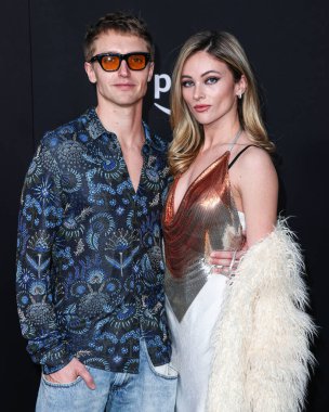 Hart Denton and Elysee Sanville arrive at the Los Angeles Premiere Of Amazon Prime Video's 'Daisy Jones & The Six' Season 1 held at the TCL Chinese Theatre IMAX on February 23, 2023 in Hollywood, Los Angeles, California, United States. 