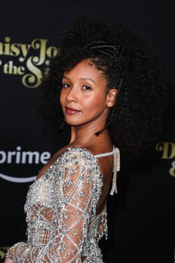 Brazilian actress Nabiyah Be wearing a PatBo dress arrives at the Los Angeles Premiere Of Amazon Prime Video's 'Daisy Jones & The Six' Season 1 held at the TCL Chinese Theatre IMAX on February 23, 2023 in Hollywood, Los Angeles, California