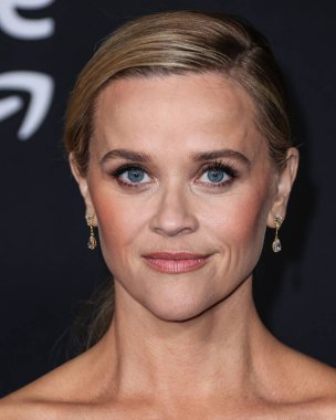 American actress Reese Witherspoon wearing a Schiaparelli dress and Reza jewelry arrives at the Los Angeles Premiere Of Amazon Prime Video's 'Daisy Jones & The Six' Season 1 held at the TCL Chinese Theatre IMAX on February 23, 2023 in Hollywood