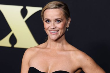 American actress Reese Witherspoon wearing a Schiaparelli dress and Reza jewelry arrives at the Los Angeles Premiere Of Amazon Prime Video's 'Daisy Jones & The Six' Season 1 held at the TCL Chinese Theatre IMAX on February 23, 2023 in Hollywood