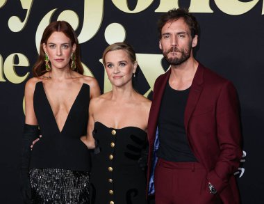 Riley Keough, Reese Witherspoon and Sam Claflin arrive at the Los Angeles Premiere Of Amazon Prime Video's 'Daisy Jones & The Six' Season 1 held at the TCL Chinese Theatre IMAX on February 23, 2023 in Hollywood, Los Angeles, California, United States