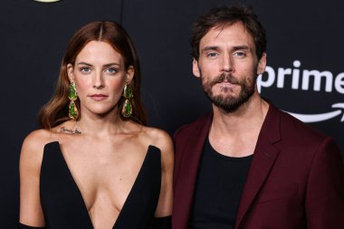 Riley Keough and Sam Claflin arrive at the Los Angeles Premiere Of Amazon Prime Video's 'Daisy Jones & The Six' Season 1 held at the TCL Chinese Theatre IMAX on February 23, 2023 in Hollywood, Los Angeles, California, United States. 