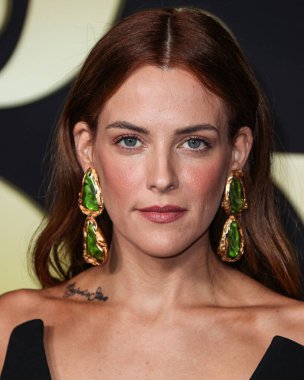 American actress Riley Keough wearing a Schiaparelli Couture dress arrives at the Los Angeles Premiere Of Amazon Prime Video's 'Daisy Jones & The Six' Season 1 held at the TCL Chinese Theatre IMAX on February 23, 2023 in Hollywood, Los Angeles