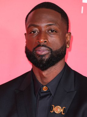 Dwyane Wade wearing Versace arrives at the 54th Annual NAACP Image Awards held at the Pasadena Civic Auditorium on February 25, 2023 in Pasadena, Los Angeles, California, United States.