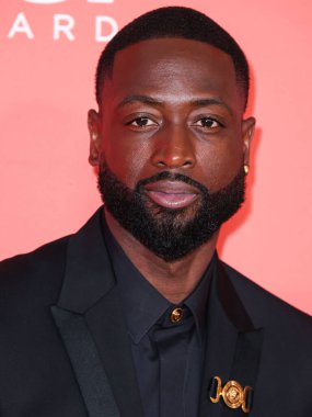 Dwyane Wade wearing Versace arrives at the 54th Annual NAACP Image Awards held at the Pasadena Civic Auditorium on February 25, 2023 in Pasadena, Los Angeles, California, United States.