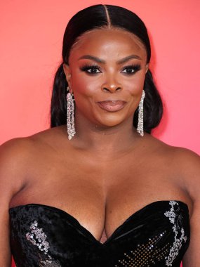 Janelle James wearing Christian Siriano PF23 arrives at the 54th Annual NAACP Image Awards held at the Pasadena Civic Auditorium on February 25, 2023 in Pasadena, Los Angeles, California, United States. 