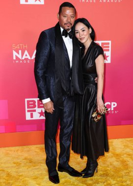 Terrence Howard and Miranda Pak arrive at the 54th Annual NAACP Image Awards held at the Pasadena Civic Auditorium on February 25, 2023 in Pasadena, Los Angeles, California, United States.