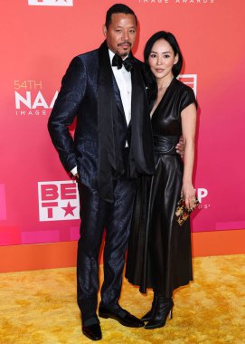 Terrence Howard and Miranda Pak arrive at the 54th Annual NAACP Image Awards held at the Pasadena Civic Auditorium on February 25, 2023 in Pasadena, Los Angeles, California, United States.