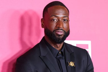 Dwyane Wade, recipient of the President's Award wearing Versace poses in the press room at the 54th Annual NAACP Image Awards held at the Pasadena Civic Auditorium on February 25, 2023 in Pasadena, Los Angeles, California, United States.