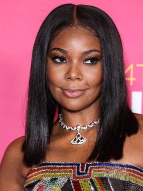 American actress Gabrielle Union, recipient of the President's Award poses in the press room at the 54th Annual NAACP Image Awards held at the Pasadena Civic Auditorium on February 25, 2023 in Pasadena, Los Angele, California, United States.