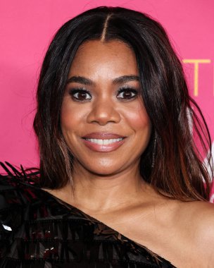 American actress Regina Hall carrying Tyler Ellis poses in the press room at the 54th Annual NAACP Image Awards held at the Pasadena Civic Auditorium on February 25, 2023 in Pasadena, Los Angeles, California, United States.