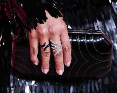 American actress Regina Hall carrying Tyler Ellis poses in the press room at the 54th Annual NAACP Image Awards held at the Pasadena Civic Auditorium on February 25, 2023 in Pasadena, Los Angeles, California, United States.