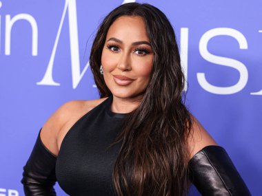 Adrienne Bailon Houghton arrives at the 2023 Billboard Women In Music held at the YouTube Theater on March 1, 2023 in Inglewood, Los Angeles, California, United States. 