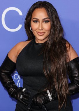 Adrienne Bailon Houghton arrives at the 2023 Billboard Women In Music held at the YouTube Theater on March 1, 2023 in Inglewood, Los Angeles, California, United States. 