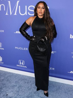 Adrienne Bailon Houghton arrives at the 2023 Billboard Women In Music held at the YouTube Theater on March 1, 2023 in Inglewood, Los Angeles, California, United States. 
