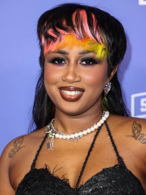 Baby Tate arrives at the 2023 Billboard Women In Music held at the YouTube Theater on March 1, 2023 in Inglewood, Los Angeles, California, United States.