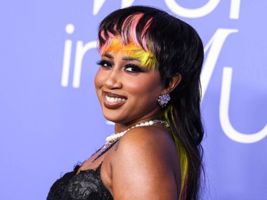 Baby Tate arrives at the 2023 Billboard Women In Music held at the YouTube Theater on March 1, 2023 in Inglewood, Los Angeles, California, United States.