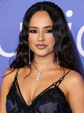 Becky G wearing a Nicolas Jebran dress arrives at the 2023 Billboard Women In Music held at the YouTube Theater on March 1, 2023 in Inglewood, Los Angeles, California, United States.