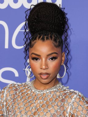 Chloe Bailey wearing a Giambattista Valli dress and Jacob and Co. jewelry arrives at the 2023 Billboard Women In Music held at the YouTube Theater on March 1, 2023 in Inglewood, Los Angeles, California, United States. 