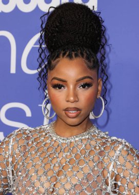 Chloe Bailey wearing a Giambattista Valli dress and Jacob and Co. jewelry arrives at the 2023 Billboard Women In Music held at the YouTube Theater on March 1, 2023 in Inglewood, Los Angeles, California, United States. 