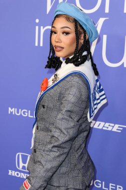 Coi Leray wearing a Kenzo look arrives at the 2023 Billboard Women In Music held at the YouTube Theater on March 1, 2023 in Inglewood, Los Angeles, California, United States.
