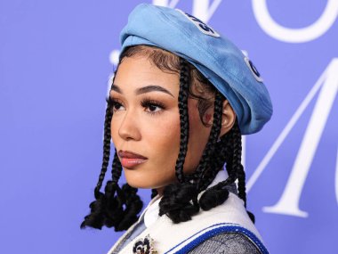 Coi Leray wearing a Kenzo look arrives at the 2023 Billboard Women In Music held at the YouTube Theater on March 1, 2023 in Inglewood, Los Angeles, California, United States.