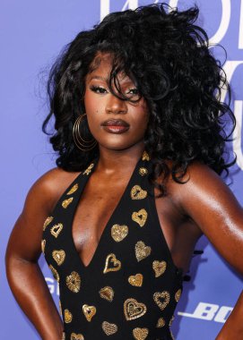 Doechii arrives at the 2023 Billboard Women In Music held at the YouTube Theater on March 1, 2023 in Inglewood, Los Angeles, California, United States. 