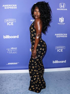 Doechii arrives at the 2023 Billboard Women In Music held at the YouTube Theater on March 1, 2023 in Inglewood, Los Angeles, California, United States. 