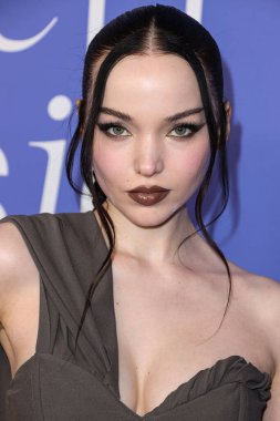 Dove Cameron wearing a Jacquemus dress, Giuseppe Zanotti shoes, and Tyler Ellis clutch arrives at the 2023 Billboard Women In Music held at the YouTube Theater on March 1, 2023 in Inglewood, Los Angeles, California, United States. 