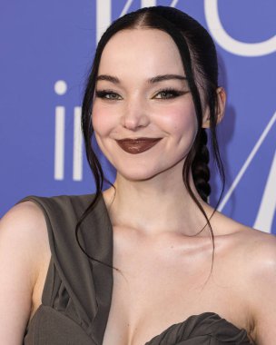 Dove Cameron wearing a Jacquemus dress, Giuseppe Zanotti shoes, and Tyler Ellis clutch arrives at the 2023 Billboard Women In Music held at the YouTube Theater on March 1, 2023 in Inglewood, Los Angeles, California, United States. 