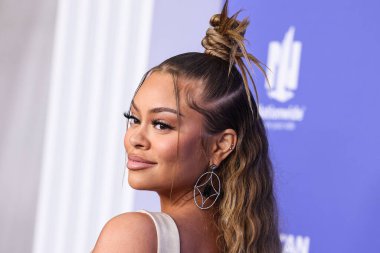 Latto arrives at the 2023 Billboard Women In Music held at the YouTube Theater on March 1, 2023 in Inglewood, Los Angeles, California, United States.  clipart