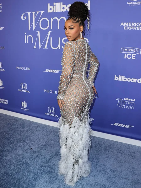 stock image Chloe Bailey wearing a Giambattista Valli dress and Jacob and Co. jewelry arrives at the 2023 Billboard Women In Music held at the YouTube Theater on March 1, 2023 in Inglewood, Los Angeles, California, United States. 