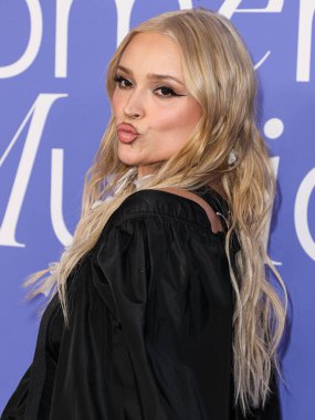 Lolo Zoua arrives at the 2023 Billboard Women In Music held at the YouTube Theater on March 1, 2023 in Inglewood, Los Angeles, California, United States.