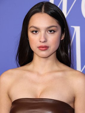 Olivia Rodrigo wearing a Jacquemus dress, Giuseppe Zanotti shoes, and Tyler Ellis clutch arrives at the 2023 Billboard Women In Music held at the YouTube Theater on March 1, 2023 in Inglewood, Los Angeles, California, United States. 