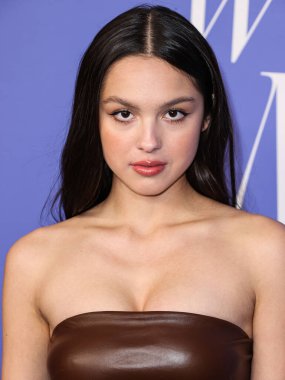 Olivia Rodrigo wearing a Jacquemus dress, Giuseppe Zanotti shoes, and Tyler Ellis clutch arrives at the 2023 Billboard Women In Music held at the YouTube Theater on March 1, 2023 in Inglewood, Los Angeles, California, United States. 