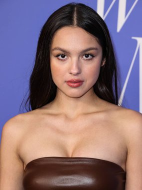 Olivia Rodrigo wearing a Jacquemus dress, Giuseppe Zanotti shoes, and Tyler Ellis clutch arrives at the 2023 Billboard Women In Music held at the YouTube Theater on March 1, 2023 in Inglewood, Los Angeles, California, United States. 