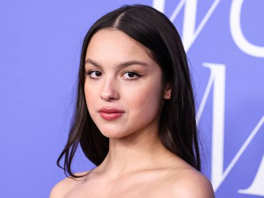 Olivia Rodrigo wearing a Jacquemus dress, Giuseppe Zanotti shoes, and Tyler Ellis clutch arrives at the 2023 Billboard Women In Music held at the YouTube Theater on March 1, 2023 in Inglewood, Los Angeles, California, United States. 