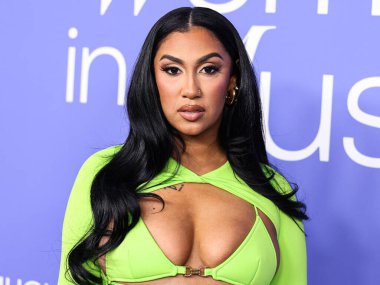 Queen Naija arrives at the 2023 Billboard Women In Music held at the YouTube Theater on March 1, 2023 in Inglewood, Los Angeles, California, United States.