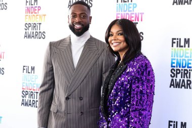 Dwyane Wade and wife Gabrielle Union arrive at the 2023 Film Independent Spirit Awards held at the Santa Monica Beach on March 4, 2023 in Santa Monica, Los Angeles, California, United States.