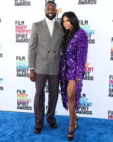 Dwyane Wade and wife Gabrielle Union arrive at the 2023 Film Independent Spirit Awards held at the Santa Monica Beach on March 4, 2023 in Santa Monica, Los Angeles, California, United States.