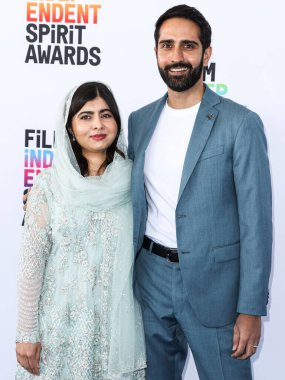 Malala Yousafzai and Asser Malik arrive at the 2023 Film Independent Spirit Awards held at the Santa Monica Beach on March 4, 2023 in Santa Monica, Los Angeles, California, United States.