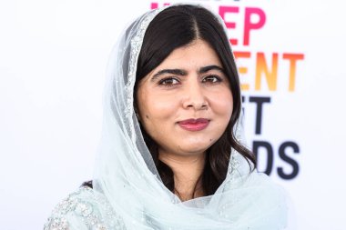 Pakistani education activist Malala Yousafzai arrives at the 2023 Film Independent Spirit Awards held at the Santa Monica Beach on March 4, 2023 in Santa Monica, Los Angeles, California, United States. clipart