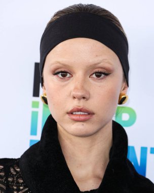 Mia Goth wearing John Galliano FW98 RTW arrives at the 2023 Film Independent Spirit Awards held at the Santa Monica Beach on March 4, 2023 in Santa Monica, Los Angeles, California, United States. 