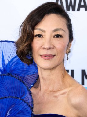 Michelle Yeoh wearing a Gucci dress arrives at the 2023 Film Independent Spirit Awards held at the Santa Monica Beach on March 4, 2023 in Santa Monica, Los Angeles, California, United States. 