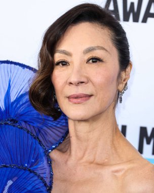 Michelle Yeoh wearing a Gucci dress arrives at the 2023 Film Independent Spirit Awards held at the Santa Monica Beach on March 4, 2023 in Santa Monica, Los Angeles, California, United States. 