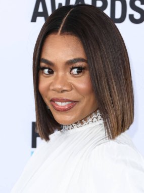 Regina Hall wearing Andrew Kwon, Irene Neurwith jewelry, a Tyler Ellis bag and Alexandre Birman shoes arrives at the 2023 Film Independent Spirit Awards held at the Santa Monica Beach on March 4, 2023 in Santa Monica, Los Angeles, California, USA
