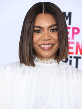 Regina Hall wearing Andrew Kwon, Irene Neurwith jewelry, a Tyler Ellis bag and Alexandre Birman shoes arrives at the 2023 Film Independent Spirit Awards held at the Santa Monica Beach on March 4, 2023 in Santa Monica, Los Angeles, California, USA