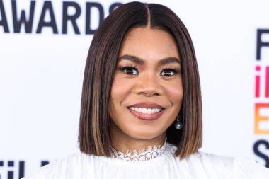 Regina Hall wearing Andrew Kwon, Irene Neurwith jewelry, a Tyler Ellis bag and Alexandre Birman shoes arrives at the 2023 Film Independent Spirit Awards held at the Santa Monica Beach on March 4, 2023 in Santa Monica, Los Angeles, California, USA